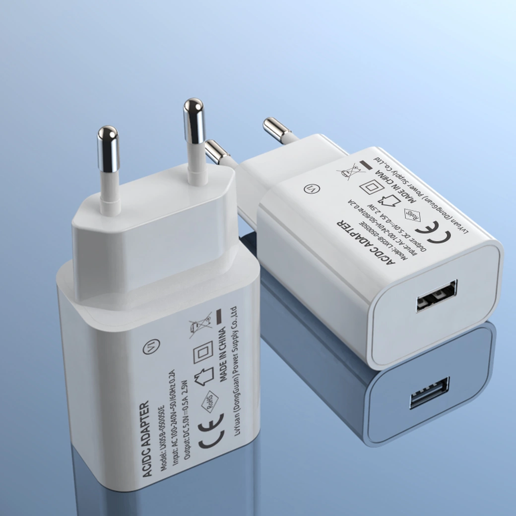 A 5V USB wall charger is a type of power adapter that converts AC voltage from a wall outlet into 5V DC voltage to power USB devices. It typically has a standard AC plug that can be connected to a wall outlet and a USB Type-A port for charging.